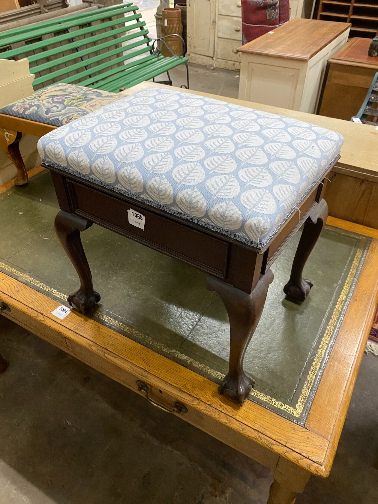 A 1920's mahogany box seat piano stool, 49cm, and an oak and beech foot stool, 97cm